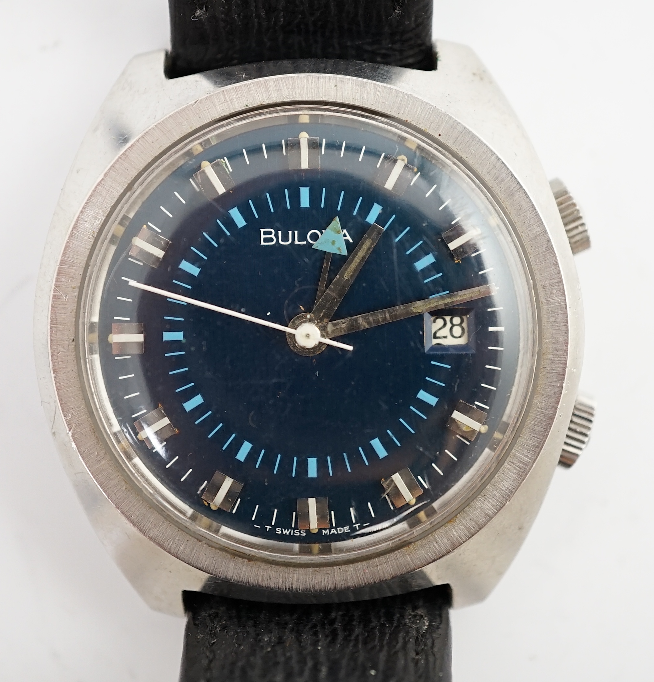 A gentleman's early 1970's stainless steel Bulova alarm manual wind wrist watch